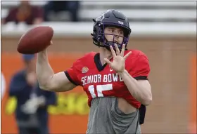  ?? BUTCH DILL — THE ASSOCIATED PRESS ?? Max Duggan of TCU throws a pass during practice for the Senior Bowl on Thursday.