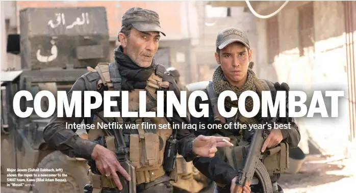  ?? NETFLIX ?? Major Jasem (Suhail Dabbach, left) shows the ropes to a newcomer to the SWAT team, Kawa (Bilal Adam Bessa), in “Mosul.”