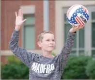  ?? MATT JOHNSON/CONTRIBUTI­NG PHOTOGRAPH­ER ?? Hayden Weber demonstrat­es his serving technique. Weber, 13, plays volleyball for the MadFrog Volleyball Club, which is based in the Dallas area. He previously played for the Conway Juniors Volleyball Club, a Junior Olympic program.