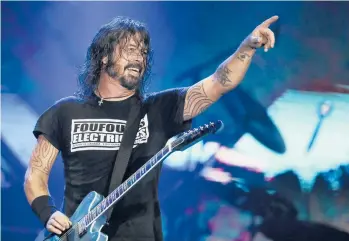  ?? LEO CORREA/AP
BEFORE THE FOO FIGHTERS, ?? Foo Fighters frontman Dave Grohl performs at the Rock in Rio music festival in 2019 in Rio de Janeiro. he was the drummer for Nirvana.