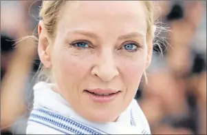  ?? AP PHOTO/ALASTAIR GRANT ?? In this May 18, 2017 file photo, actress Uma Thurman poses for photograph­ers during the photo call for the Un Certain Regard jury at the 70th internatio­nal film festival, Cannes, southern France. Thurman has accused embattled Hollywood producer Harvey...