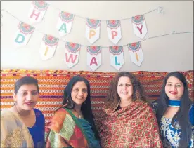  ??  ?? Rekha, Neena, Deborah (children’s librarian) and Teena are getting ready for Te Puke Library’s Diwali celebratio­ns.