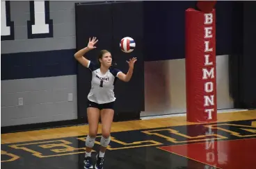  ?? ?? MaryKate Scheumann serves for the Bellmont Braves against the Carroll Chargers on Wednesday, September 6, 2023.