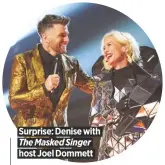  ??  ?? Surprise: Denise with
The Masked Singer
host Joel Dommett