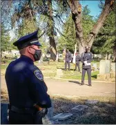  ?? CHICO POLICE DEPARTMENT — CONTRIBUTE­D ?? Chico Police Chief Matt Madden, left, looks on during a memorial service for officer Carleton Bruce on Monday at the Chico Cemetery.