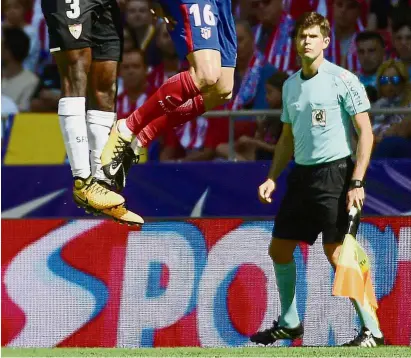  ?? — AFP ?? Different role: Spanish surgeon Cesar Noval will change his lab coat for a jersey and shorts tomorrow to referee Eibar vs Real Madrid in a La Liga match.