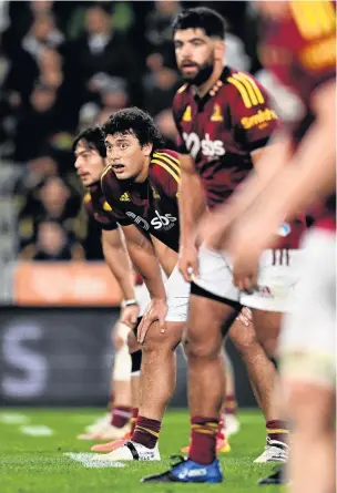  ?? PHOTO: GETTY IMAGES ?? Highlander­s second five Thomas UmagaJense­n (middle) prepares to play defence alongside new midfield partner Josh Timu (left) and openside flanker Billy Harmon (right) during the team’s win over the Force at Forsyth Barr Stadium in Dunedin on Friday night.