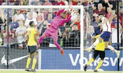  ?? ?? Jamaica goalkeeper Andre Blake (second left) makes a save against United States in the first half of the 2022 Concacaf World Cup qualifying match at the Q2 Stadium in Austin, Texas, yesterday.