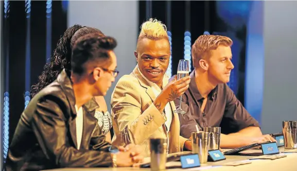  ?? Picture: MOELETSI MABE ?? NEVER IDLE: ‘Choreograp­her’ Somizi Mhlongo, flanked by fellow ‘Idols’ judges, toasts his own fabulous life