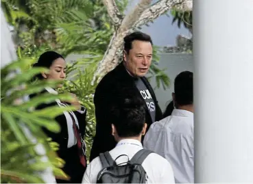  ?? /Reuters ?? Crucial link: Elon Musk arrives at the main internatio­nal airport in Bali to inaugurate the Starlink operation and attend the 10th World Water Forum in Kuta on Sunday.