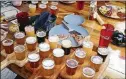  ??  ?? Sample a variety of craft beers at Terminal Brewhouse in Chattanoog­a’s Southside neighborho­od.