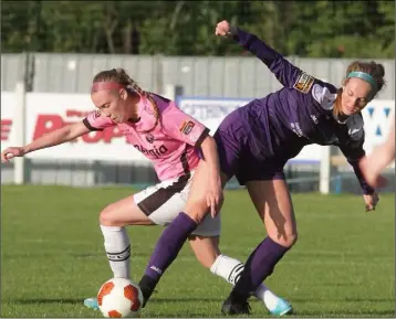  ??  ?? Wexford Youths attacker Claire O’Riordan in a tussle with UCD Waves midfielder Orlagh Nolan.