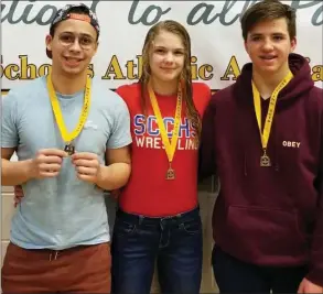  ??  ?? GOLD WINNING WRESTLERS: Sebastien Marchand, Aleah Nickel, Luke Nelson