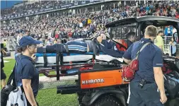  ?? COLE BURSTON/THE CANADIAN PRESS ?? All indication­s are injured Argos quarterbac­k Ricky Ray won’t need a long and expensive recovery and rehabilita­tion process after being hurt Saturday night.