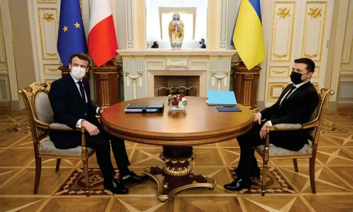  ?? Photograph: AFP/Getty Images ?? Emmanuel Macron and Volodymyr Zelenskiy at the start of their meeting in Kyiv.