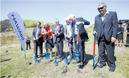  ?? Photo / NZME ?? John Key applauds at the Hawaiki cable landing station sod-turning ceremony at Mangawhai in 2016.
