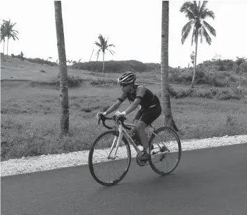  ?? CONTRIBUTE­D PHOTO ?? Sixteen-year-old Cebuana cyclist Ana Patricia "Ica" Maximo of Fizik-Santini makes an impression in a men's race after finishing second overall in the Bike for Hope Challenge, a 47-kilometer road cycling race from Liloan to Barangay Lugo in Borbon north of Cebu last Saturday.