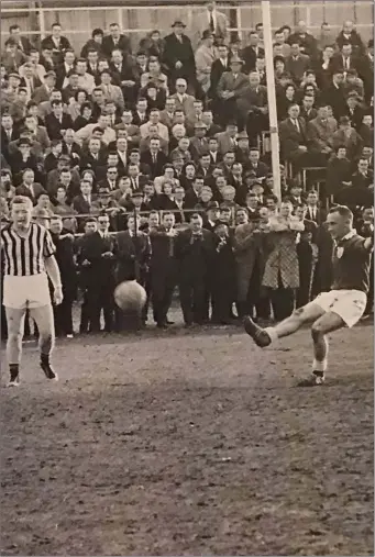  ??  ?? Former Dromtariff­e player Pat Joe Neville, on the right, playing football in New York, where he emigrated to after a short but distinguis­hed football career in north Cork