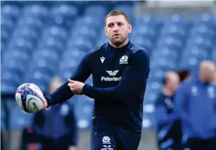  ?? ?? Key man: Scotland fly - half Finn Russell provides experience and control (Getty)