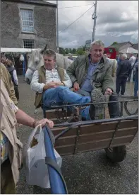  ??  ?? Soaking up the atmosphere at the Cahirmee Horse Fair.