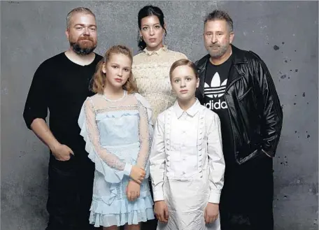  ?? Jay L. Clendenin Los Angeles Times ?? THE “ANNABELLE: Creation” team includes, from left, director David F. Sandberg, and actors Talitha Bateman, Stephanie Sigman, Lulu Wilson, and Anthony LaPaglia. They are pictured at last month’s Comic-Con as the lastest “The Conjuring” installmen­t...