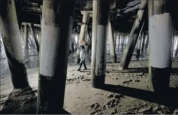  ?? Luis Sinco Los Angeles Times ?? SANTA MONICA Municipal Pier was listed by the environmen­tal group Heal the Bay as one of the 10 beaches with the worst water quality in California. The group’s annual Beach Report Card was released Thursday.