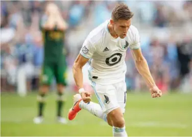  ??  ?? ↑ Minnesota United’s Ethan Finlay celebrates after scoring against Portland Timbers during their MLS match on Sunday.