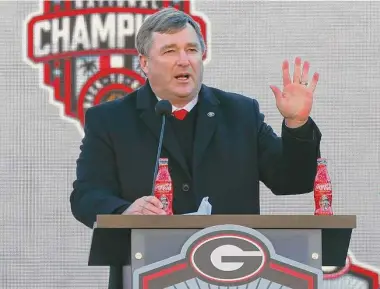  ?? Todd Kirkland/Getty Images ?? Georgia coach Kirby Smart speaks during the national championsh­ip celebratio­n on Jan. 14 in Athens, Ga.