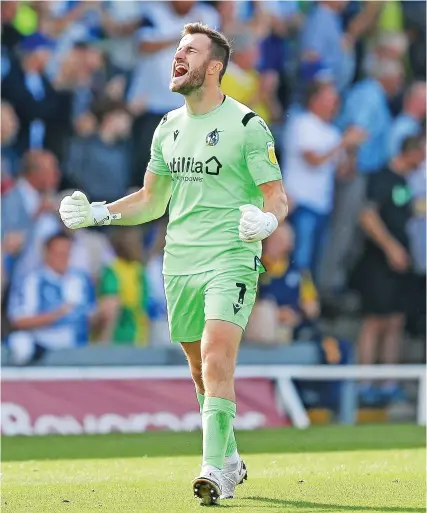  ?? Picture: Will Cooper/JMP ?? Bristol Rovers goalkeeper James Belshaw shows his delight after Leon Clarke‘s goal