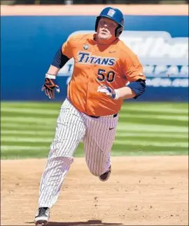  ?? Shotgun Spratling Los Angeles Times ?? JACE CHAMBERLIN is batting .322 for Cal State Fullerton, but the freshman hadn’t homered before belting a game-winning blast last Saturday.