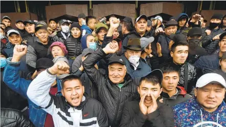  ?? VYACHESLAV OSELEDKO GETTY IMAGES ?? A large crowd protesting the results of Sunday’s parliament­ary election gather Tuesday outside the seized main government building known as the White House in Bishkek, Kyrgyzstan. The country’s election commission has annulled the result.