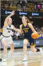  ?? AP FILE PHOTO/KATHY KMONICEK ?? UTC senior forward Abbey Cornelius (25) will get to play in the NCAA tournament for the first time in her career when the Mocs take on Virginia Tech on Friday in Blacksburg, Va. UTC first-year coach Shawn Poppie is a former Hokies assistant.