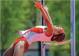  ?? JIM THOMPSON/JOURNAL ?? New Mexico’s Jamari Drake clears the bar at 5 feet, 11¼ inches to win the women’s high jump Thursday at the Don Kirby Tailwind Invitation­al home meet.