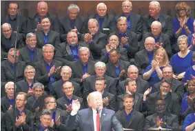  ?? CAROLYN KASTER/ASSOCIATED PRESS ?? Members of the First Baptist Church Choir watch President Donald Trump speak Saturday during the Celebrate Freedom event at the Kennedy Center in Washington.