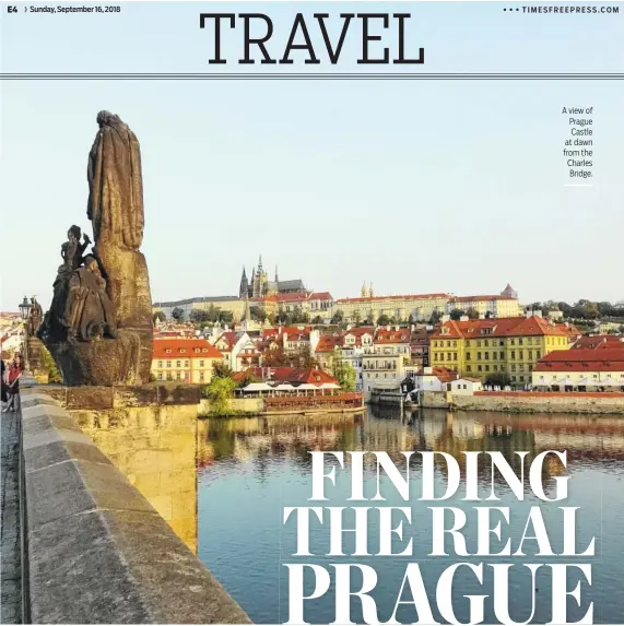  ??  ?? A view of Prague Castle at dawn from the Charles Bridge.