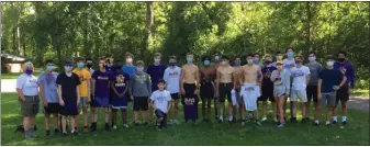  ?? SUBMITTED PHOTO ?? Coach Sandy Buchanan, far left, met with De La Salle cross country runners at River Bends Park for a Friday morning workout.