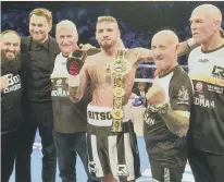  ??  ?? Lewis Ritson, centre, with his winning team.