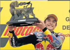  ??  ?? EN 2010. Márquez, en su primera victoria en Sachsenrin­g, en 125cc.