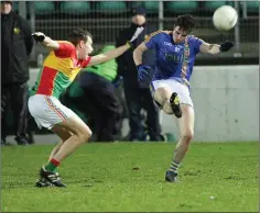  ??  ?? Wicklow’s Conor Healy fires off a shot as Sean Gannon closes in.