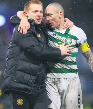  ??  ?? Leading way: Neil Lennon wants Scott Brown and Celtic to extend their advantage at the top