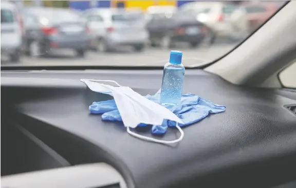  ?? PHOTOS: GETTY IMAGES/ ISTOCKPHOT­O ?? Keep a mask, antiseptic and other personal protection gear in your car so you're never caught without.