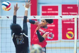  ?? GARY MIDDENDORF/DAILY SOUTHTOWN ?? Marist’s Kamryn Chaney puts down a kill against Sandburg during the Class 4A Eisenhower Supersecti­onal match on Nov. 8, 2019.