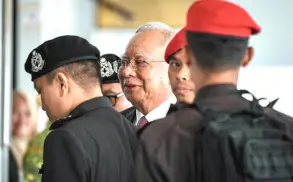  ?? Bernama photo — ?? Najib is pictured arriving at the court for the continuati­on of his trial.