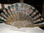  ??  ?? Left: A fan made of gold, silver and silk with Qing Dynasty imagery, a Chinese export to Europe in the 18th and 19th century, is exhibited at Liaoning Provincial Museum in Shenyang, February 12, 2021