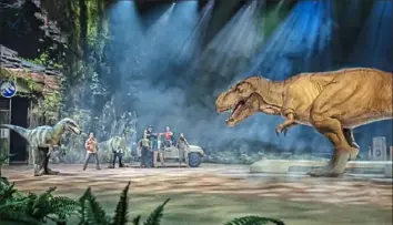 ?? Feld Entertainm­ent ?? An animatroni­c Tyrannosau­rus rex more than 40 feet in length chases scientists in Jurassic World Live.