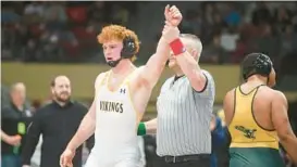  ?? BRIAN KRISTA/BALTIMORE SUN MEDIA ?? “It’s hard to describe how great it is to be the first state champion,” said Mt. Hebron senior Samuel Jordan, who capped his 40-1 campaign with a 1-0 victory over Seneca Valley’s Wayne Tabb in the Class 4A/3A 220-pound state final Saturday.