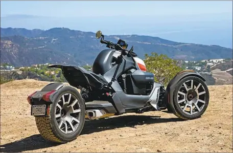  ?? Can-Am ?? CAN-AM’S PLAN to triple sales includes an outreach program and legislativ­e efforts to allow the trikes to be driven with auto licenses.