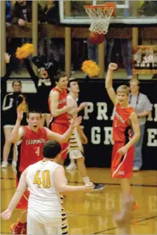  ?? MARK HUMPHREY ENTERPRISE-LEADER ?? A dream came true on Valentine’s Day. Farmington players, Skyler Barnes (left), Matt Thomas and Jeremy Mueller react jubiliantl­y as a 3-pointer launched by Prairie Grove’s McKay Gregson goes through the net. Gregson, a special needs athlete, was...