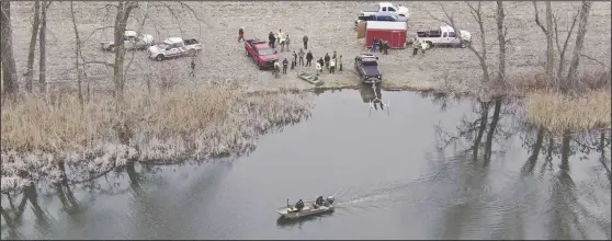  ?? ?? Divers from a number of agencies responded to a pond northwest of Shelby on Feb. 10 reporting a possible drowning. A body was recovered the next day.
Photo by city of Willard Drone Unit /Ryan Gillmor