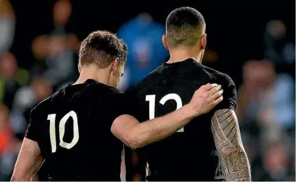  ?? PHOTOS: GETTY IMAGES ?? All Blacks stars Beauden Barrett, left, and Sonny Bill Williams share a moment, but Barrett’s erratic passing game may be hindering his team-mate’s effectiven­ess.